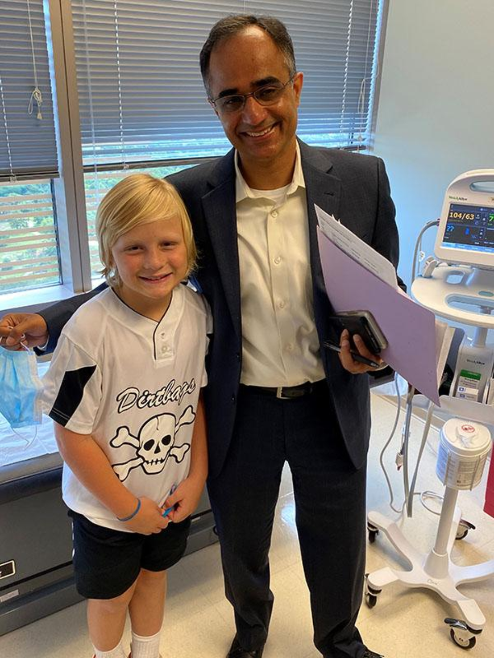 Picture of Charlie Crawmer with Nitin Tandon, MD. Photo courtesy of Sarah Crawmer.